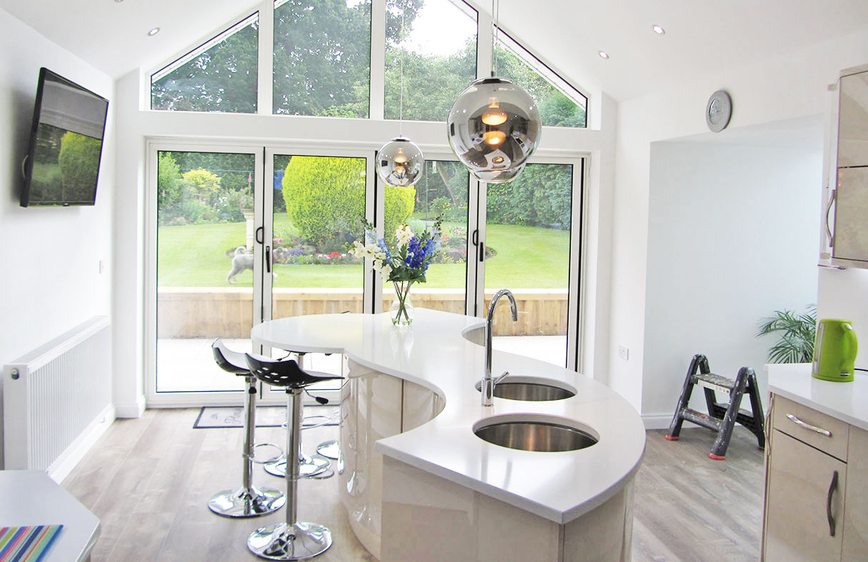 modern gloss kitchen with curved island